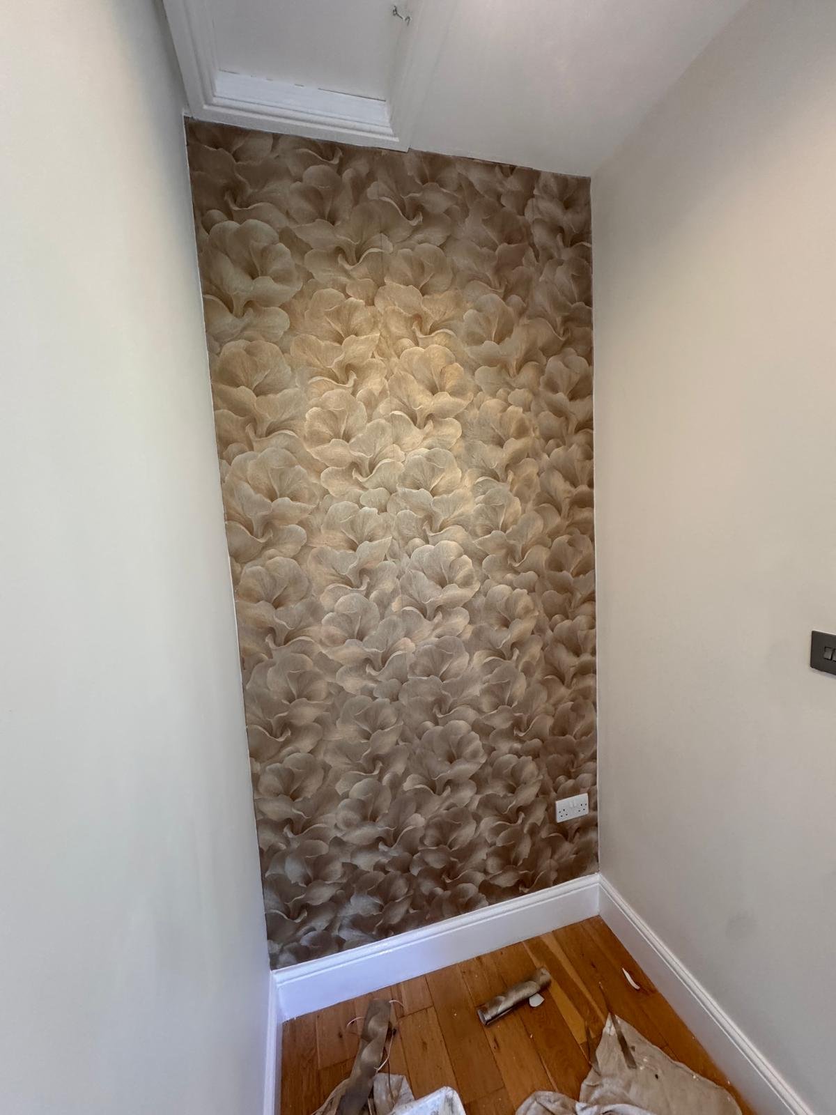 Alcove feature wall in a botanical patterned wallpaper